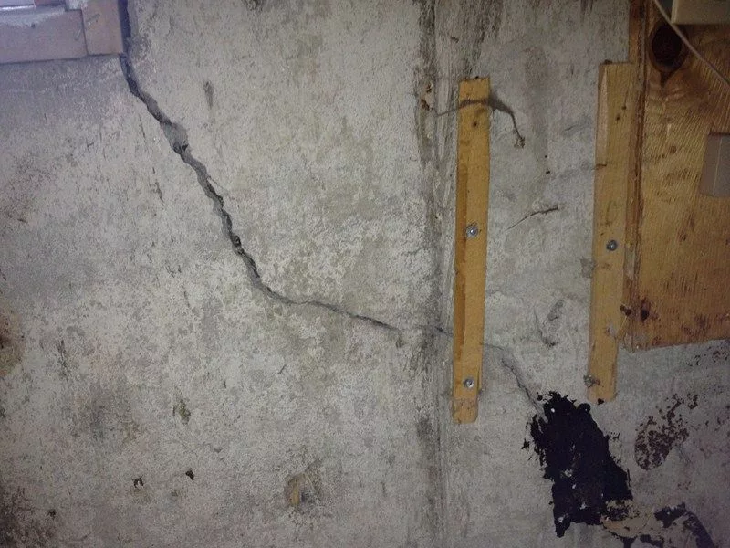 Interior foundation crack repair with polyurethane injection